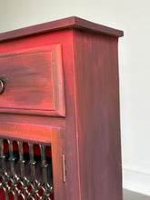 Load image into Gallery viewer, Boho style, hand painted slim cabinet. Red/orange solid wood console