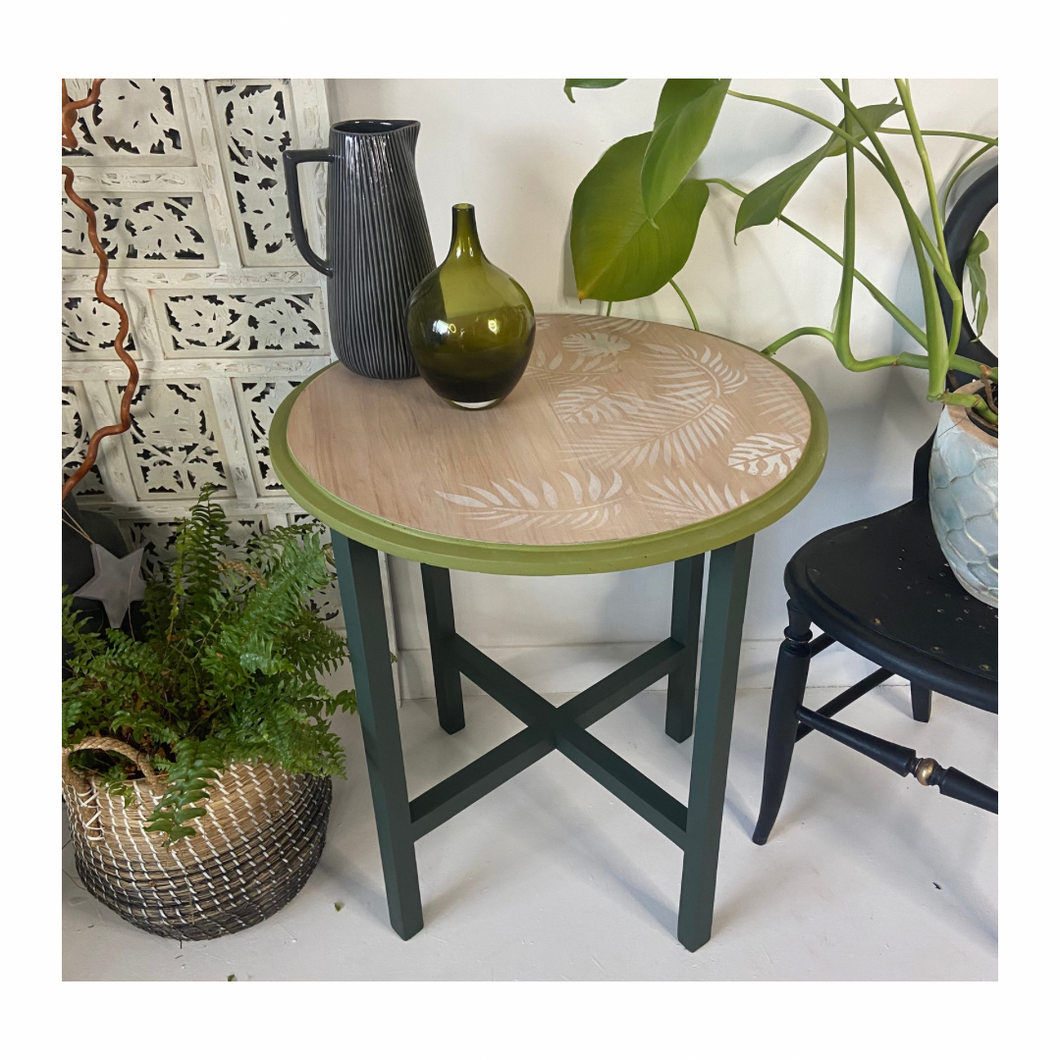 Mid-century side table, green and white with fauna design